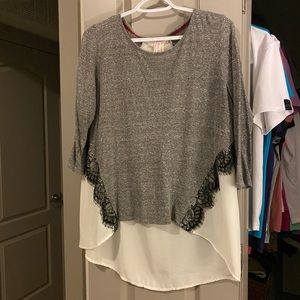 Quarter sleeve high low top